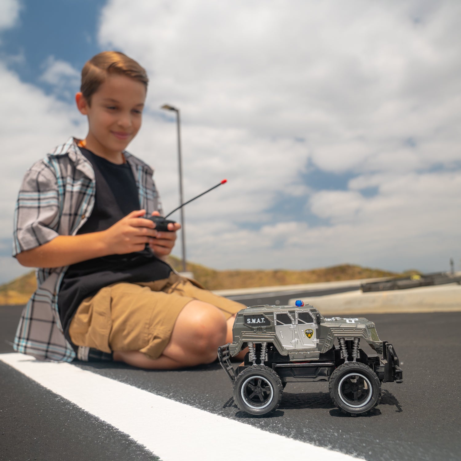 child monster truck fishing pole World Tech Toys S.W.A.T. 1:24 RTR Electric Remote Control RC Monster Police Truck